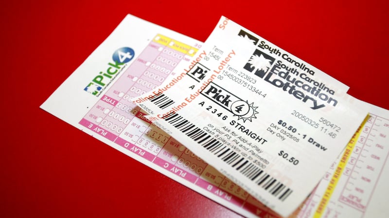 FILE: Lottery tickets purchased by Wayne Chavis of Charlotte, N.C. sit on a counter at Big...